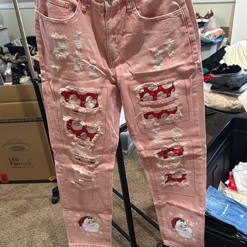 Brand new women’s L Santa pink ripped jeans Christmas party ready